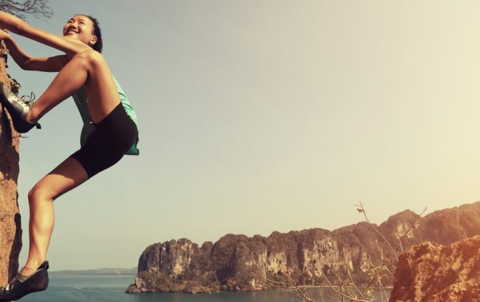 young asian woman enjoy the view at spring mountain peak